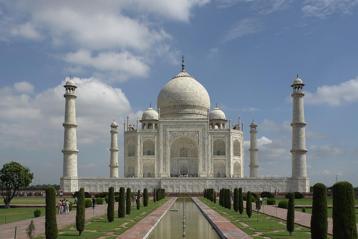 The Taj Mahal in Agra seen across its gardens and long reflecting pool