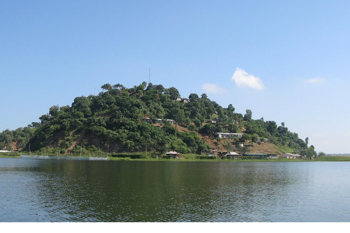 Loktak Lake in Manipur with a small wooded island in still water